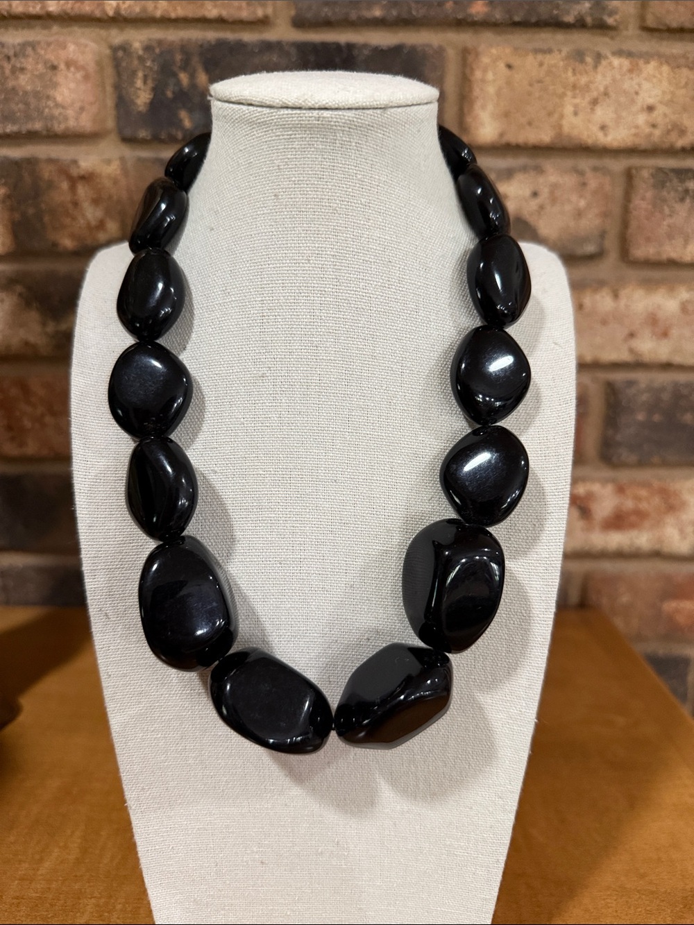 Black graduated large beaded statement necklace